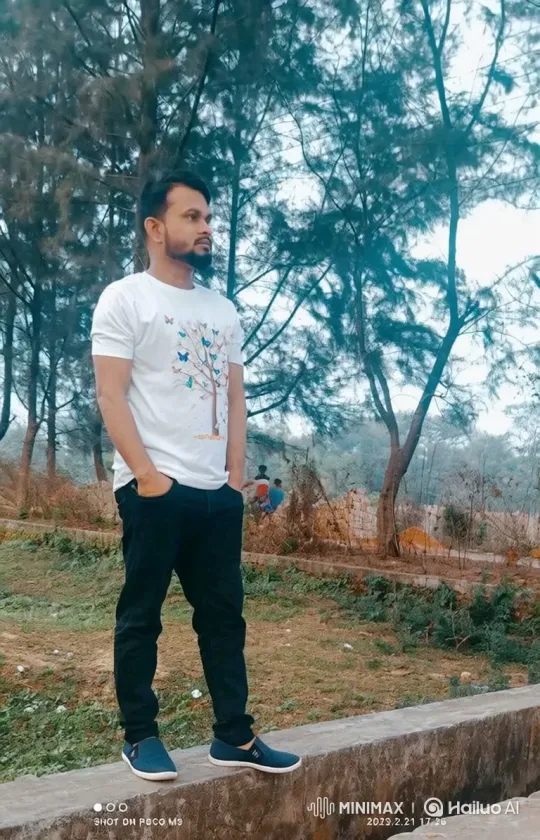 Contemplative Man in Woods Amidst Gentle Breeze – AI Generated Video | Hailuo AI