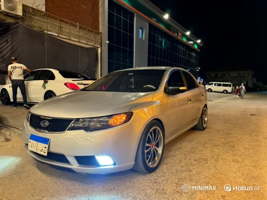 Night-time shot of a customized silver sedan with ambient lighting. – AI Generated Video | Hailuo AI