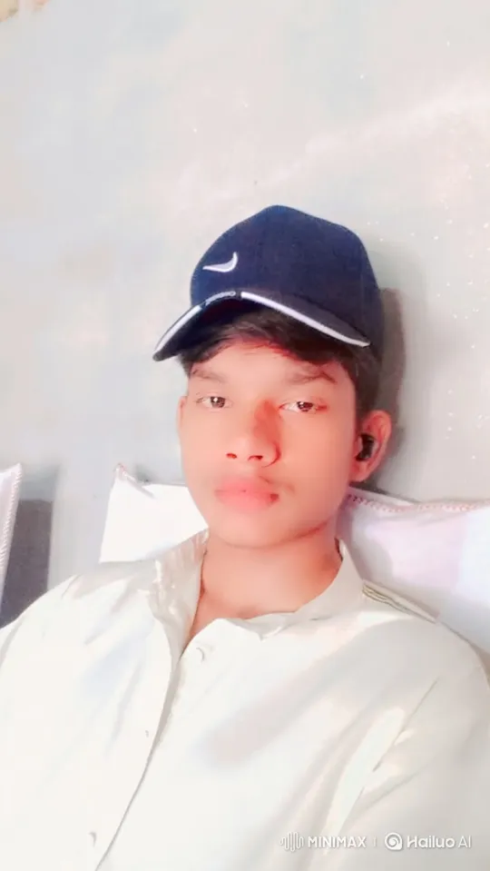 Young Man Smiles Gently, Calmly Gazing at Camera – AI Generated Video | Hailuo AI