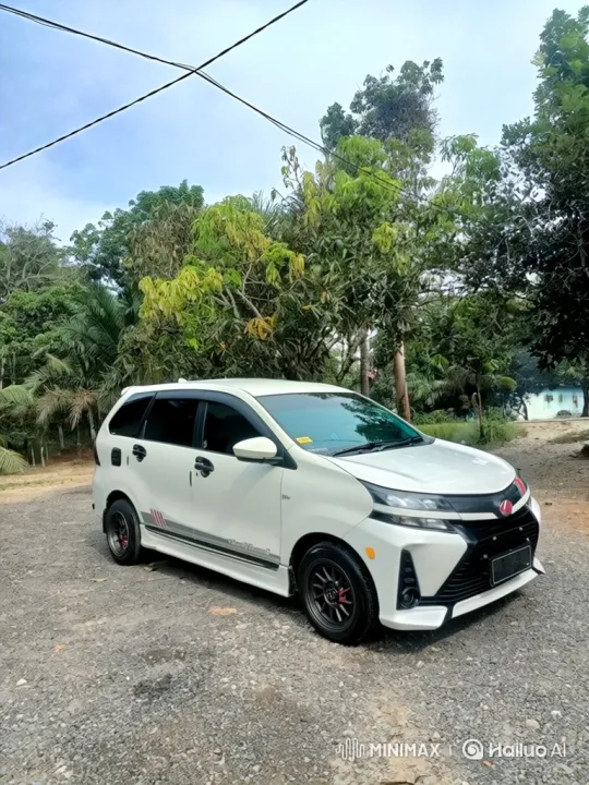 White Minivan Lowers on Gravel with Air Suspension – AI Generated Video | Hailuo AI