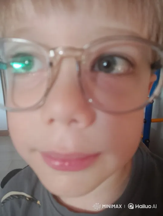Boy's Face Reflects Brightening Light, Ends in Overwhelming White – AI Generated Video | Hailuo AI