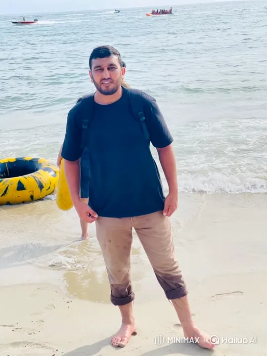 Young Man on Sandy Beach at Water's Edge – AI Generated Video | Hailuo AI