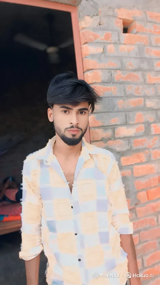 Young Man in Gentle Breeze, Steady Gaze – AI Generated Video | Hailuo AI