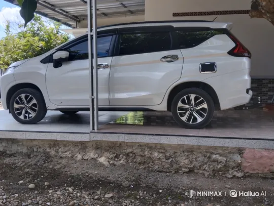 White Multi-Purpose Vehicle Lowering Smoothly on Carport – AI Generated Video | Hailuo AI