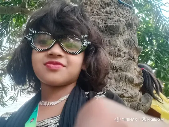 Young Girl with Sunglasses in Lush Forest – AI Generated Video | Hailuo AI
