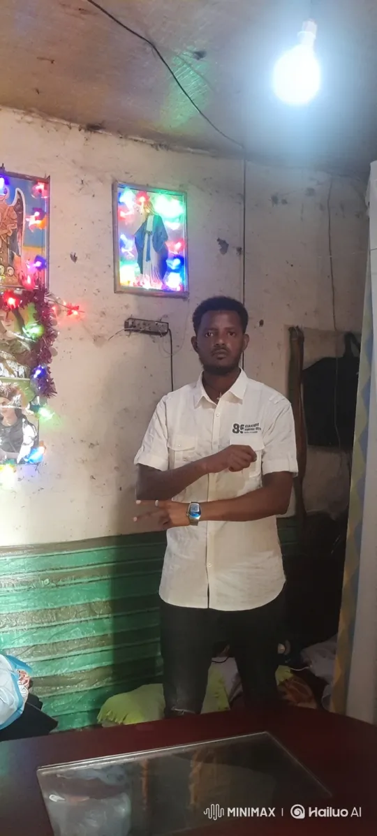 Man in White Shirt Stands Still Amidst Minimalist Room – AI Generated Video | Hailuo AI