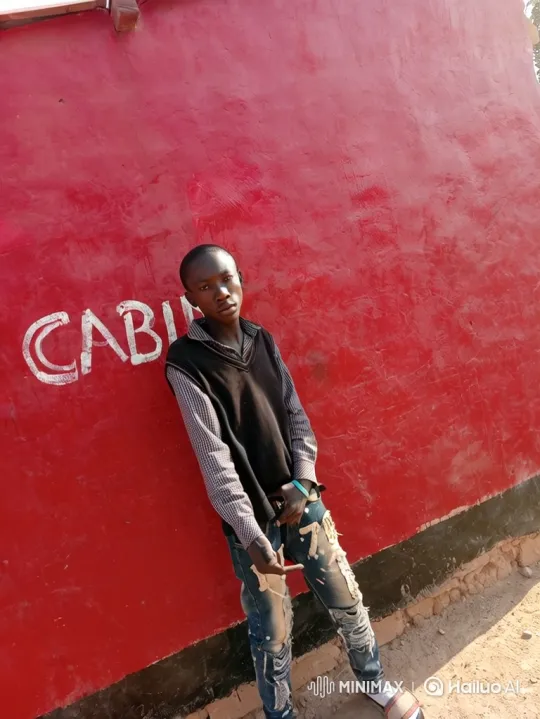 Young Man Prepares to Board Plane on Dusty Airstrip – AI Generated Video | Hailuo AI