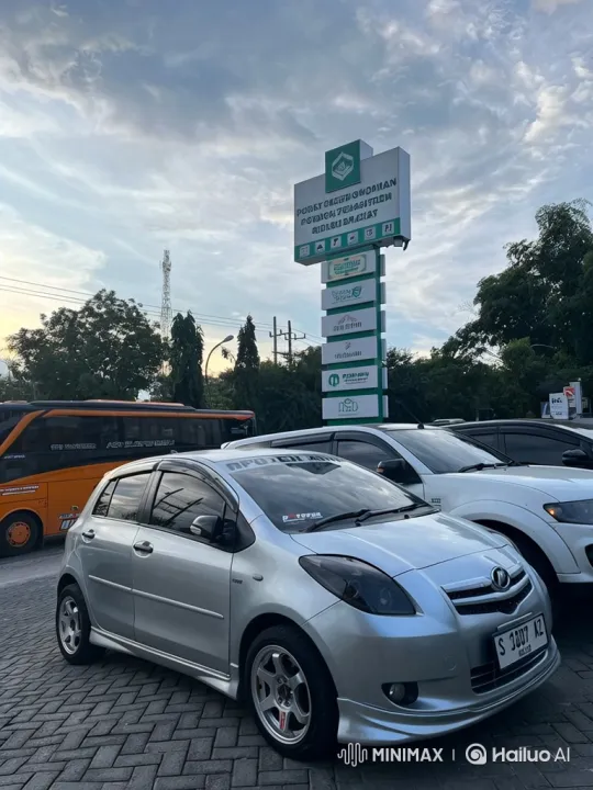 Silver Hatchback Demonstrates Advanced Air Suspension System – AI Generated Video | Hailuo AI