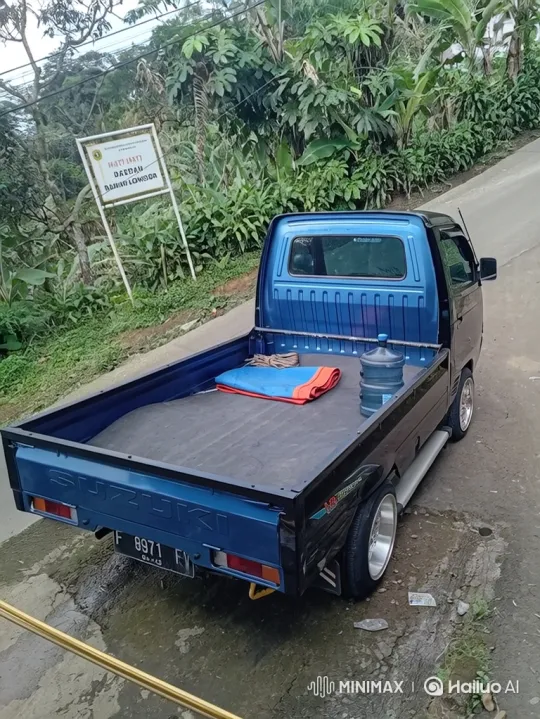 Blue Custom Suzuki Truck on Wet Road in Indonesia – AI Generated Video | Hailuo AI