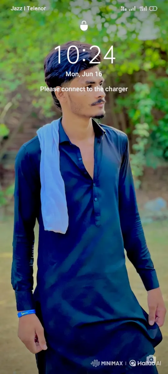 Contemplative Young Man in Serene Outdoor Setting – AI Generated Video | Hailuo AI