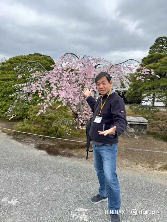 Asian Man Joyfully Flies Away in Garden Video – AI Generated Video | Hailuo AI