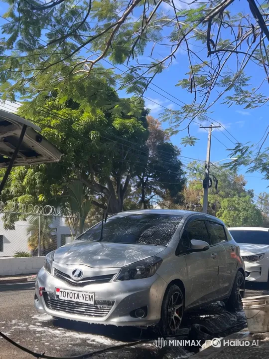 Silver Hatchback Showcases Air Suspension in Sunny Setting – AI Generated Video | Hailuo AI