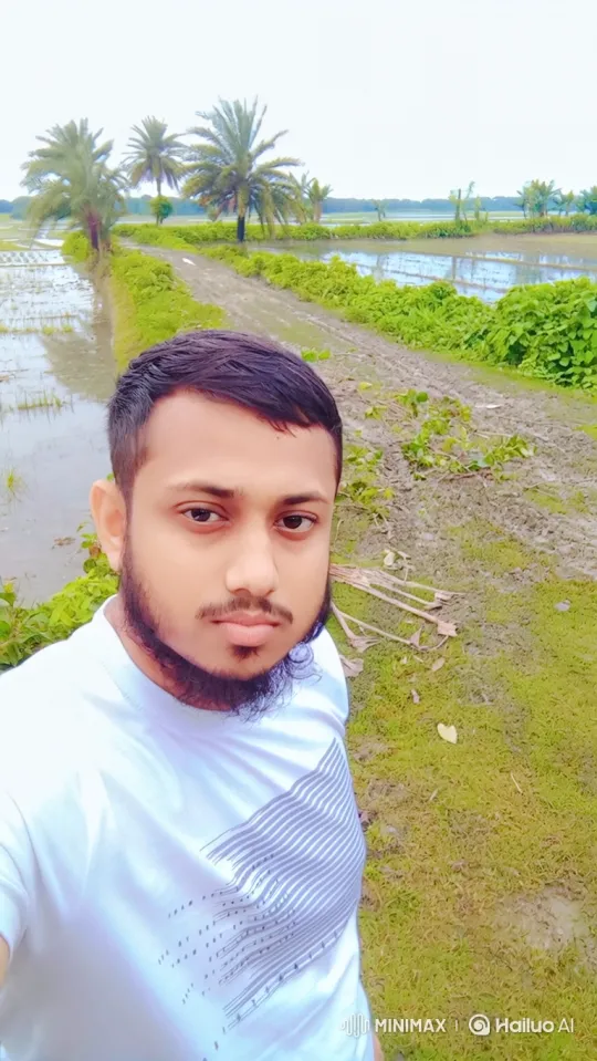 Tranquil Portrait: Man Amidst Serene Rural Landscape – AI Generated Video | Hailuo AI