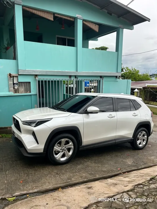 White SUV Lowering Its Suspension on Driveway – AI Generated Video | Hailuo AI