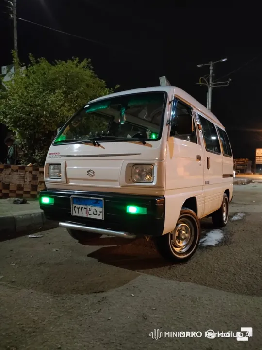 White Microvan Drifts on Dark Asphalt Street – AI Generated Video | Hailuo AI