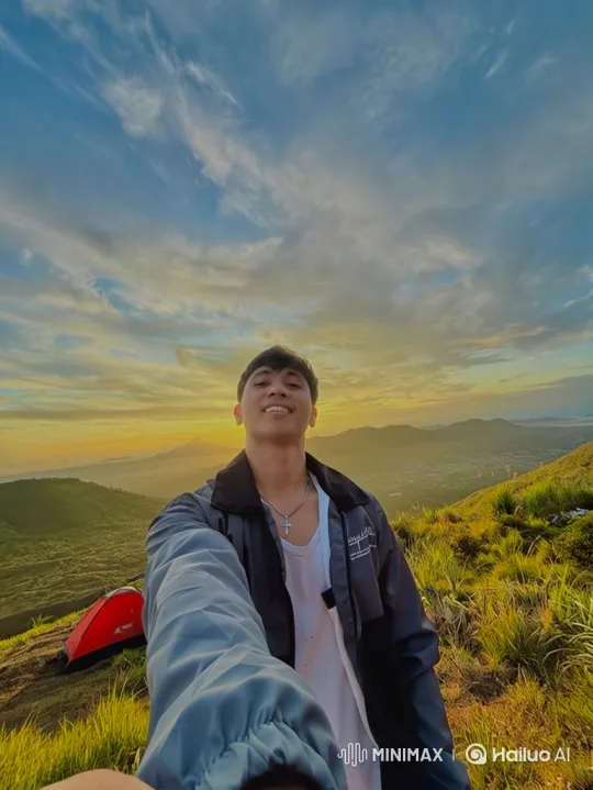 Young Man on Mountain Peak to Earth from Space Panorama – AI Generated Video | Hailuo AI