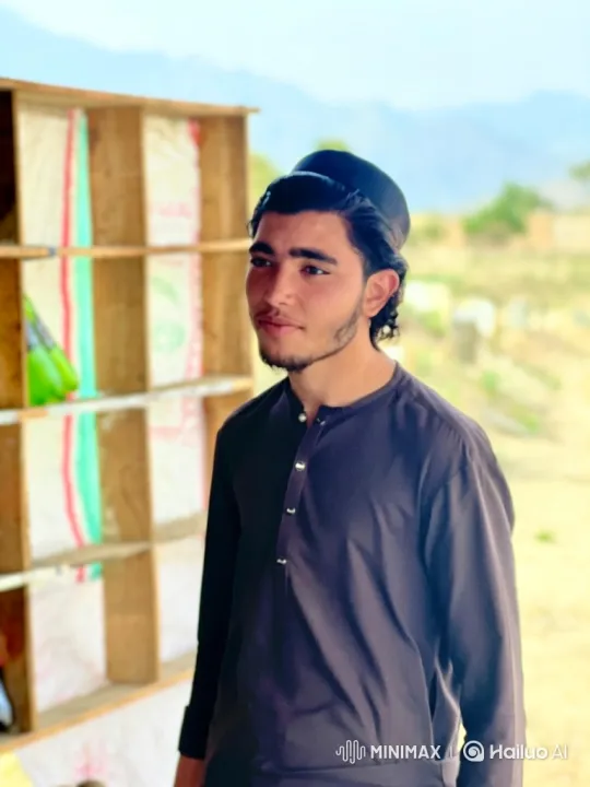 Contemplative Young Man Smiles at Camera – AI Generated Video | Hailuo AI