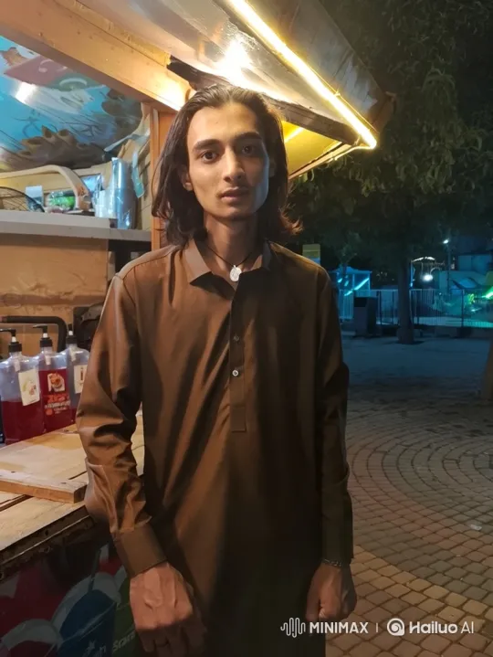 Young Couple Shares Serene Moment in Urban Park – AI Generated Video | Hailuo AI