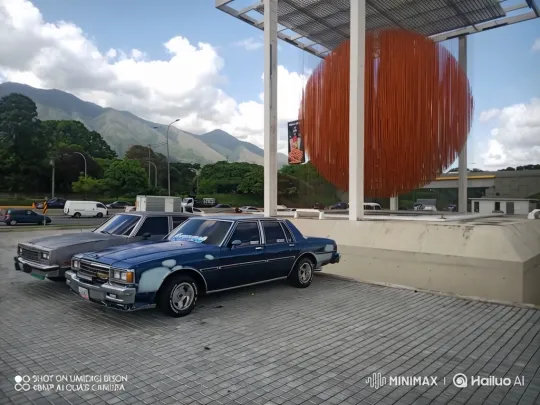 Classic Sedan Lowering on a Mountainous Background – AI Generated Video | Hailuo AI