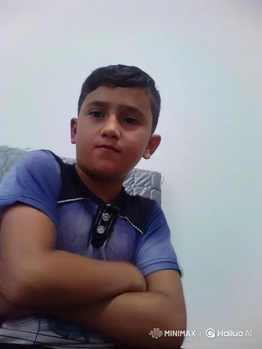 Boy Transforms from Serious to Gentle Smile – AI Generated Video | Hailuo AI