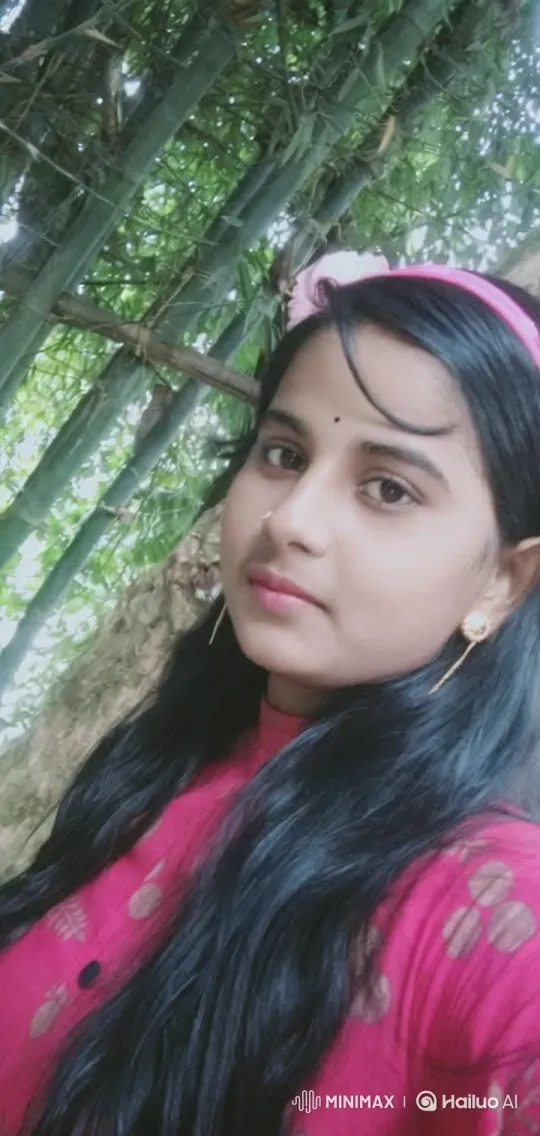 Young Woman in Bamboo Grove with Calm Expression – AI Generated Video | Hailuo AI