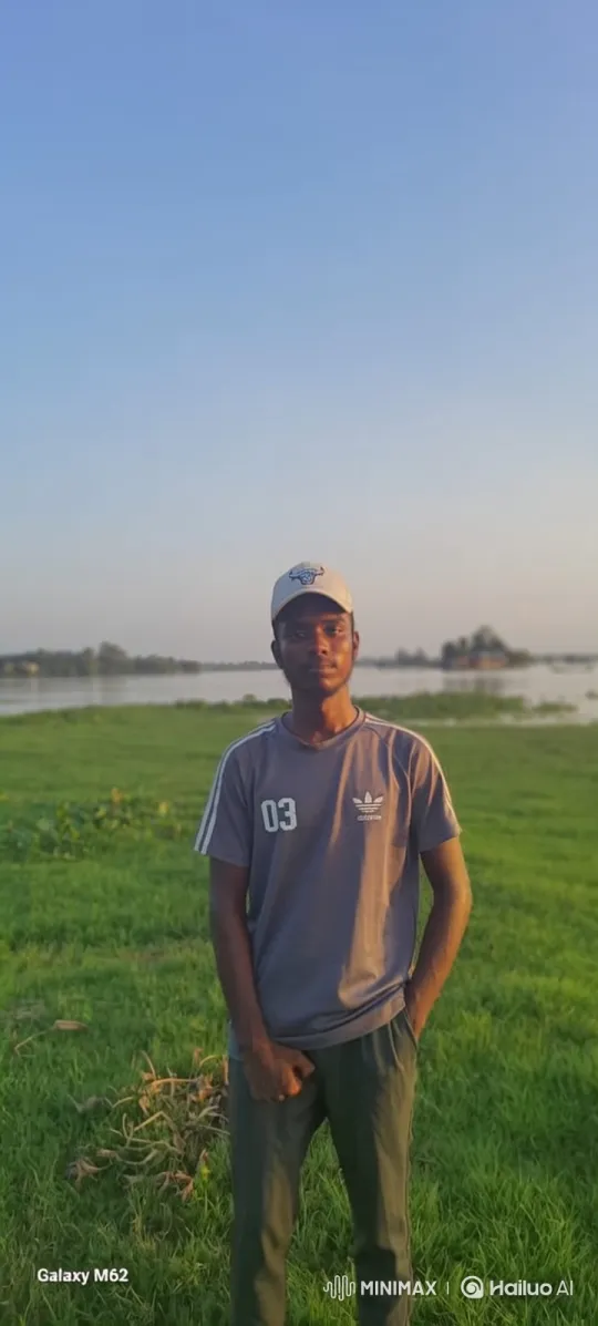 Young Man in Serene Landscape with Gentle Breeze – AI Generated Video | Hailuo AI