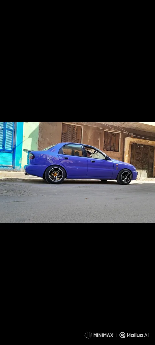 Custom Purple Sedan Demonstrates Air Suspension Lowering – AI Generated Video | Hailuo AI