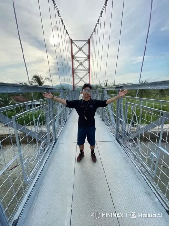 Person Enjoying Scenic View on Suspension Bridge – AI Generated Video | Hailuo AI