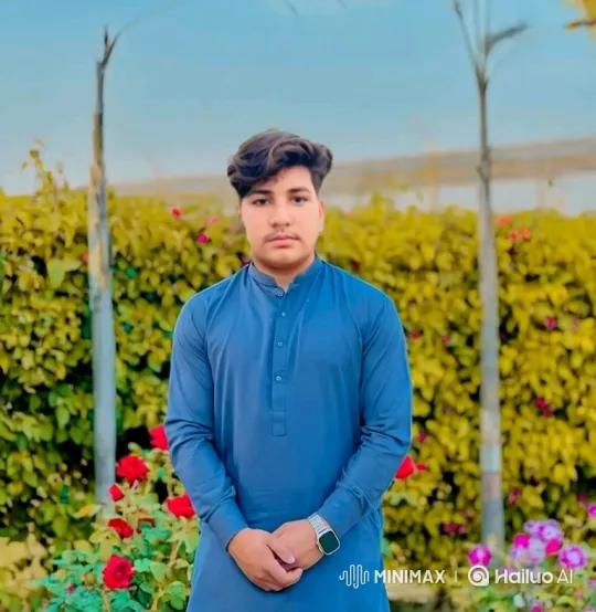 Young Man in Garden: Slow Zoom and Calm Gaze – AI Generated Video | Hailuo AI