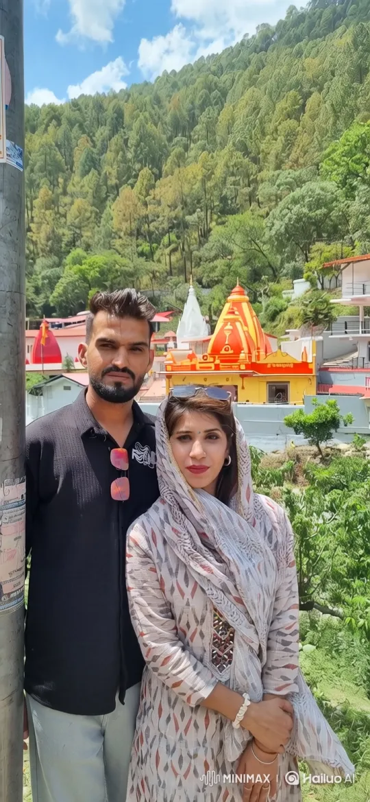 Couple by Temple Amidst Mountainous Landscape – AI Generated Video | Hailuo AI
