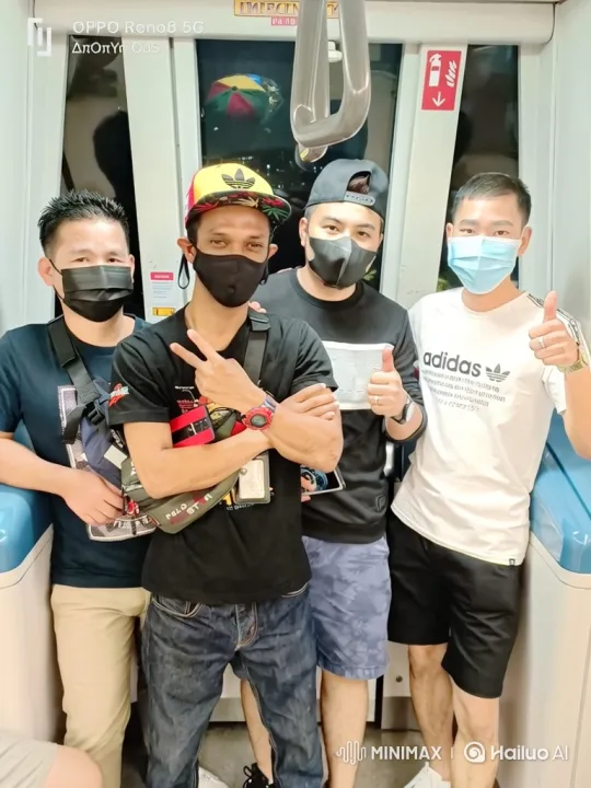 Four Men Pose for Photo in Moving Train – AI Generated Video | Hailuo AI