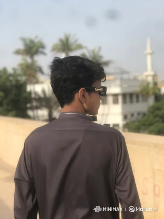 Contemplative Youth Meets Elegant Woman in Golden Hour Park Scene – AI Generated Video | Hailuo AI
