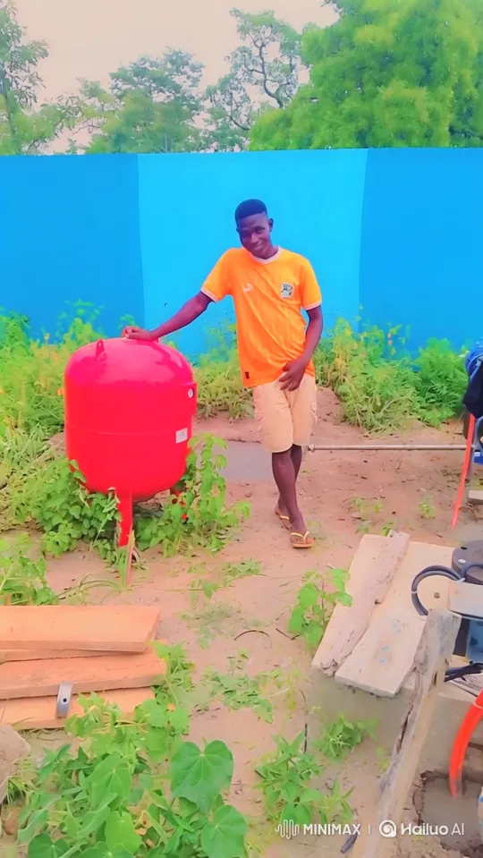 Young Man Showcases Completed Water Tank Project – AI Generated Video | Hailuo AI