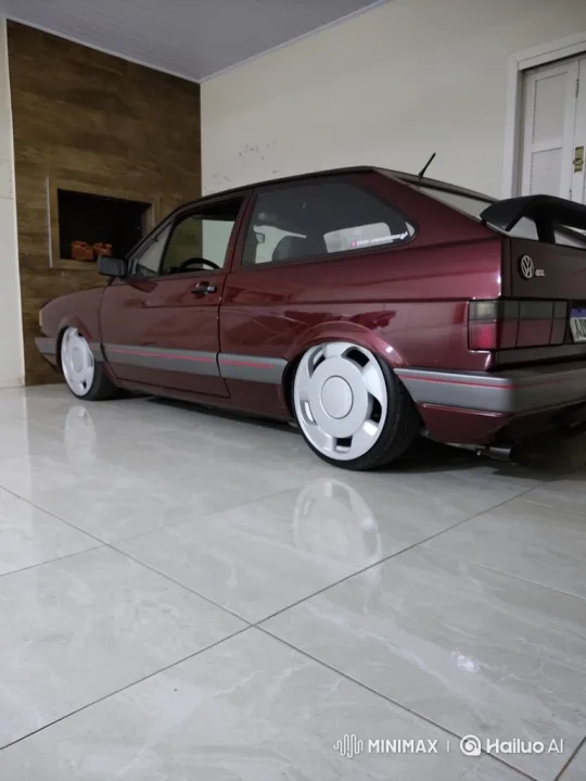 Custom Maroon Hatchback Showcases Air Suspension Lowering – AI Generated Video | Hailuo AI