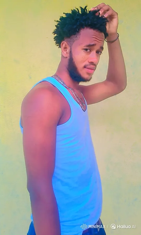 Young Man Gazing, Touching Hair in Static Frame – AI Generated Video | Hailuo AI