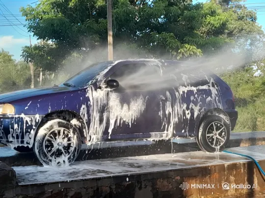 Car Washing on Raised Platform with Water Spray – AI Generated Video | Hailuo AI
