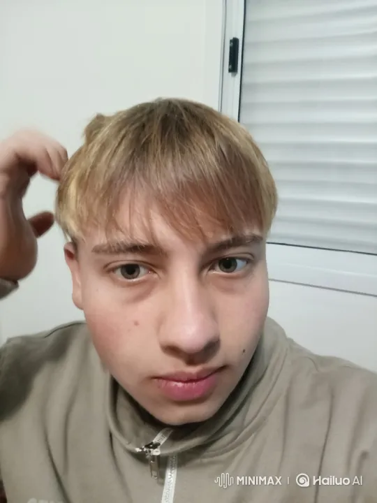 Young Person in Thoughtful Pose with Hair Grooming – AI Generated Video | Hailuo AI