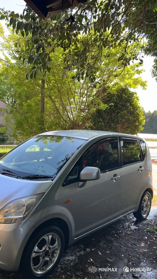 Silver Hatchback Lowering on Sunny Day – AI Generated Video | Hailuo AI