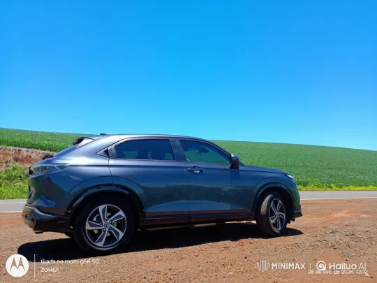 SUV Demonstrates Air Suspension Lowering on Scenic Landscape – AI Generated Video | Hailuo AI