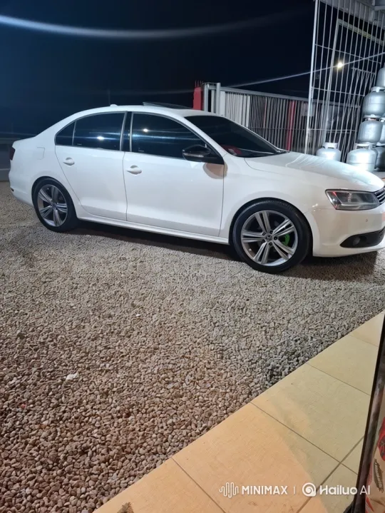White Sedan Lowering Its Body on Gravel Driveway – AI Generated Video | Hailuo AI
