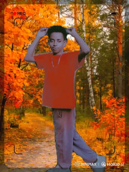 Young Man Strolls Through Autumn Forest – AI Generated Video | Hailuo AI