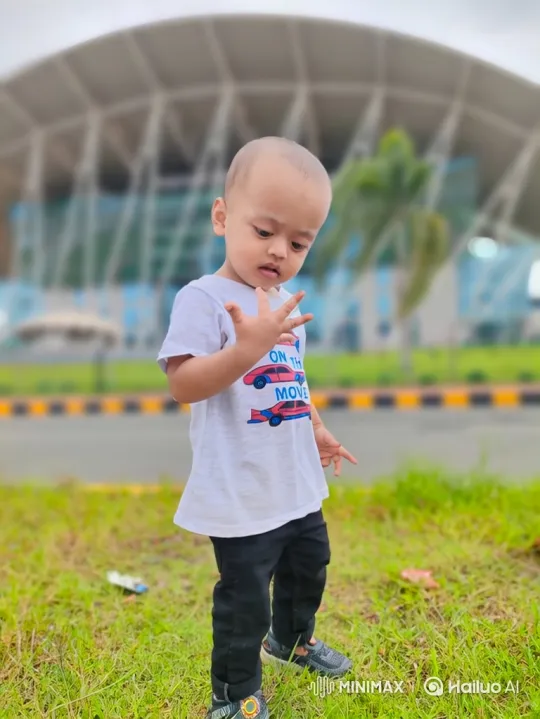 Toddler Examines Hand, Watches Passing Car – AI Generated Video | Hailuo AI