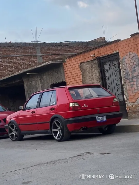 Red Hatchback Demonstrates Advanced Air Suspension System – AI Generated Video | Hailuo AI
