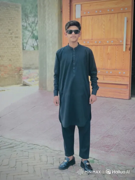Young Man in Dark Tunic Poses Confidently – AI Generated Video | Hailuo AI