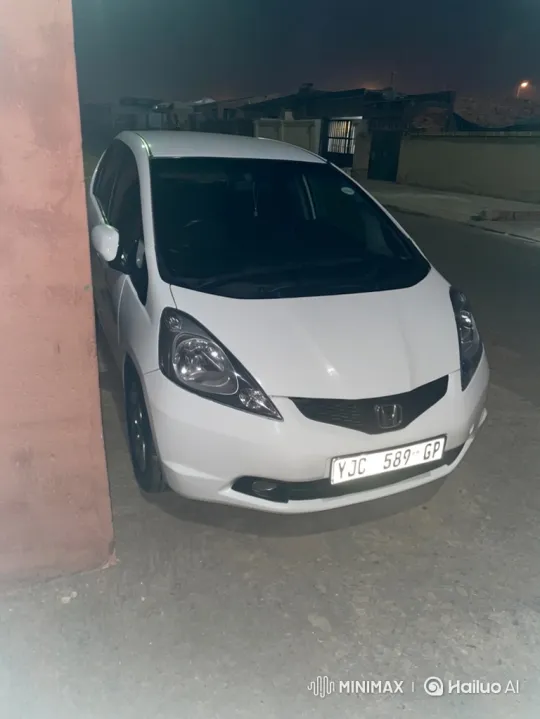 White Hatchback Transforms with Air Suspension – AI Generated Video | Hailuo AI