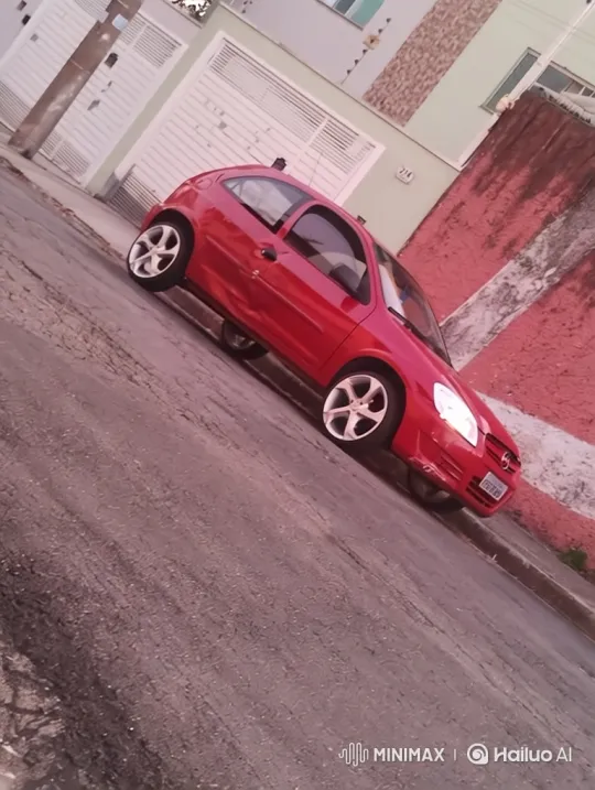 Red Hatchback's Smooth Air Suspension Descent – AI Generated Video | Hailuo AI