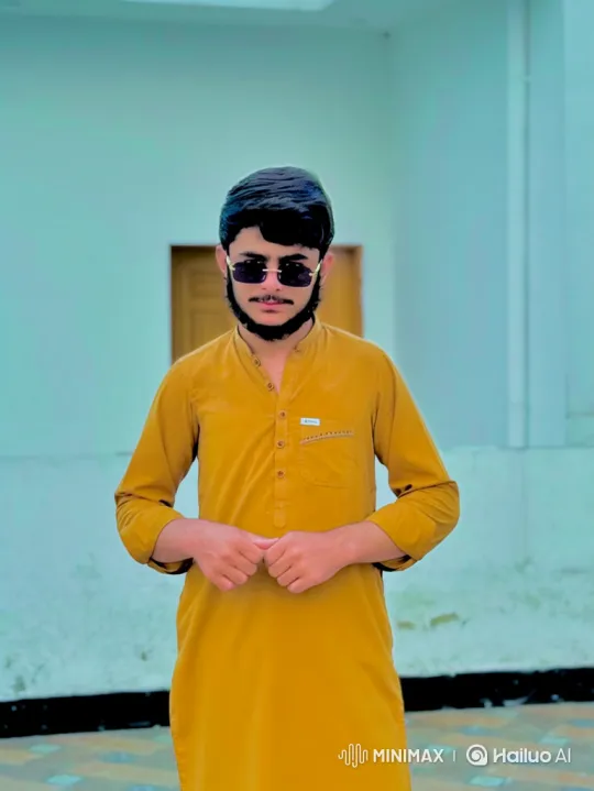 Stylish Man in Mustard Tunic Displays Calm Poise – AI Generated Video | Hailuo AI