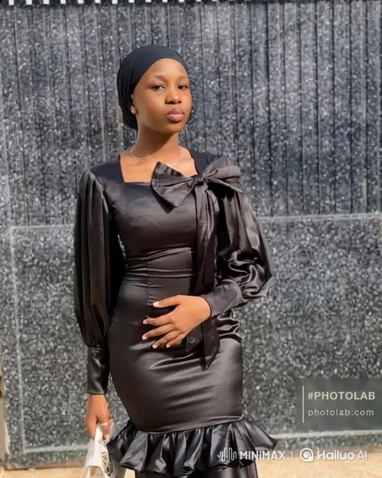 Graceful Woman in Black Satin Dress Poses – AI Generated Video | Hailuo AI