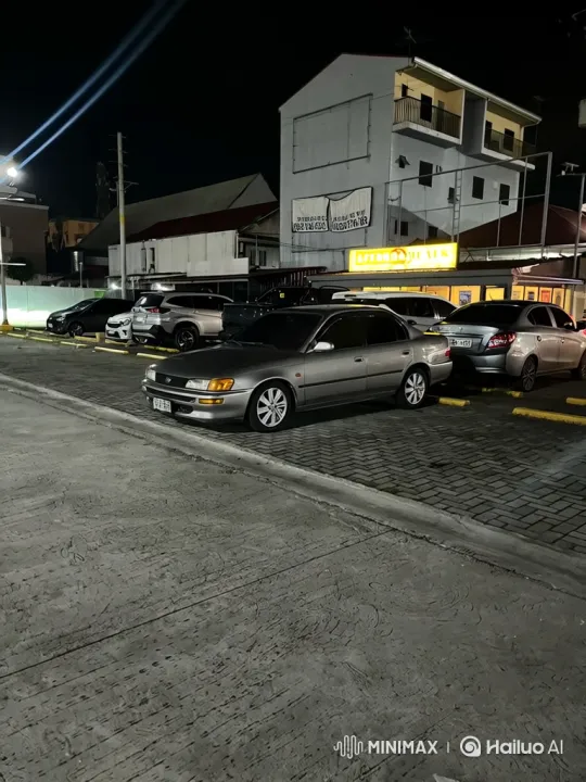 Silver Sedan Lowering Its Suspension at Night – AI Generated Video | Hailuo AI