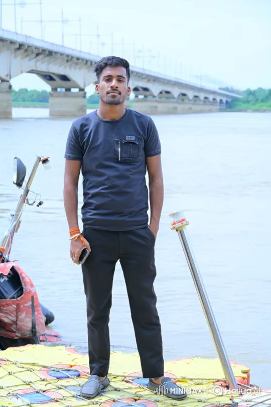 Young Man Meets Man Resembling Modi on Riverbank – AI Generated Video | Hailuo AI